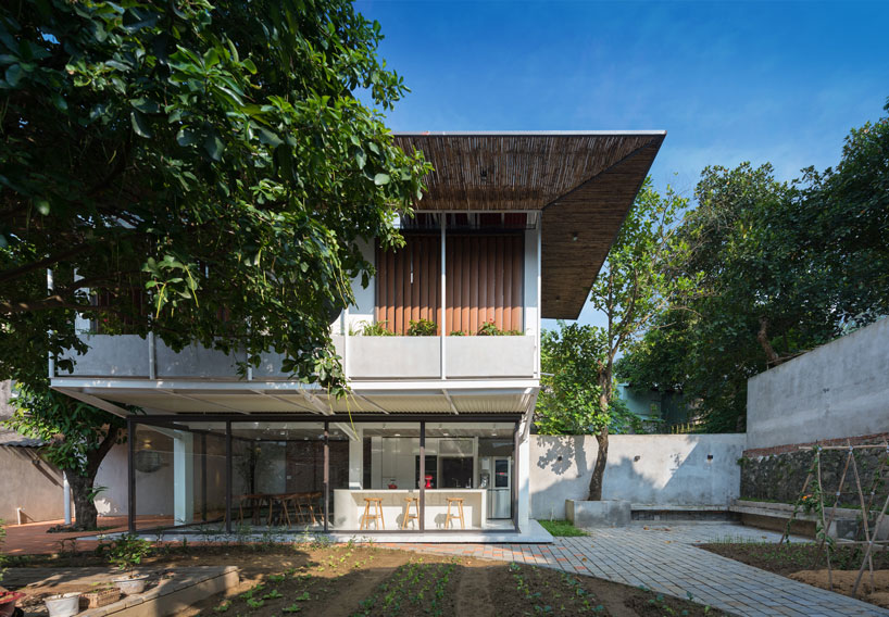 AD+studio builds the 'stacking-roof-house' for a young couple in vietnam designboom