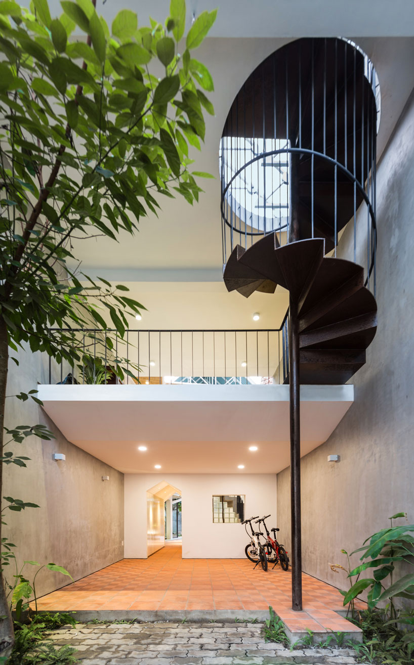 AD+studio builds the 'stacking-roof-house' for a young couple in vietnam designboom