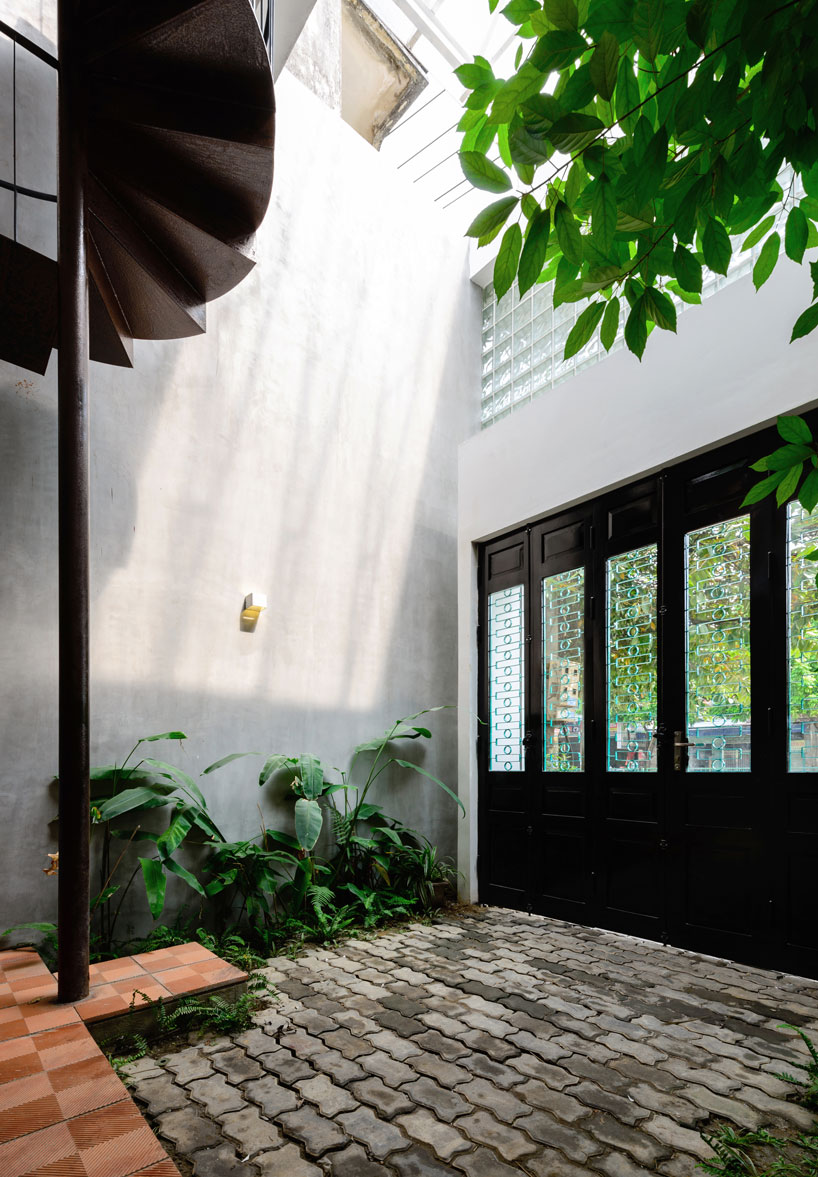 AD+studio builds the 'stacking-roof-house' for a young couple in vietnam designboom
