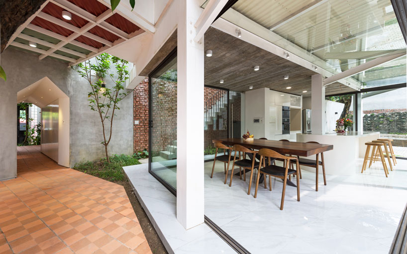 AD+studio builds the 'stacking-roof-house' for a young couple in vietnam designboom