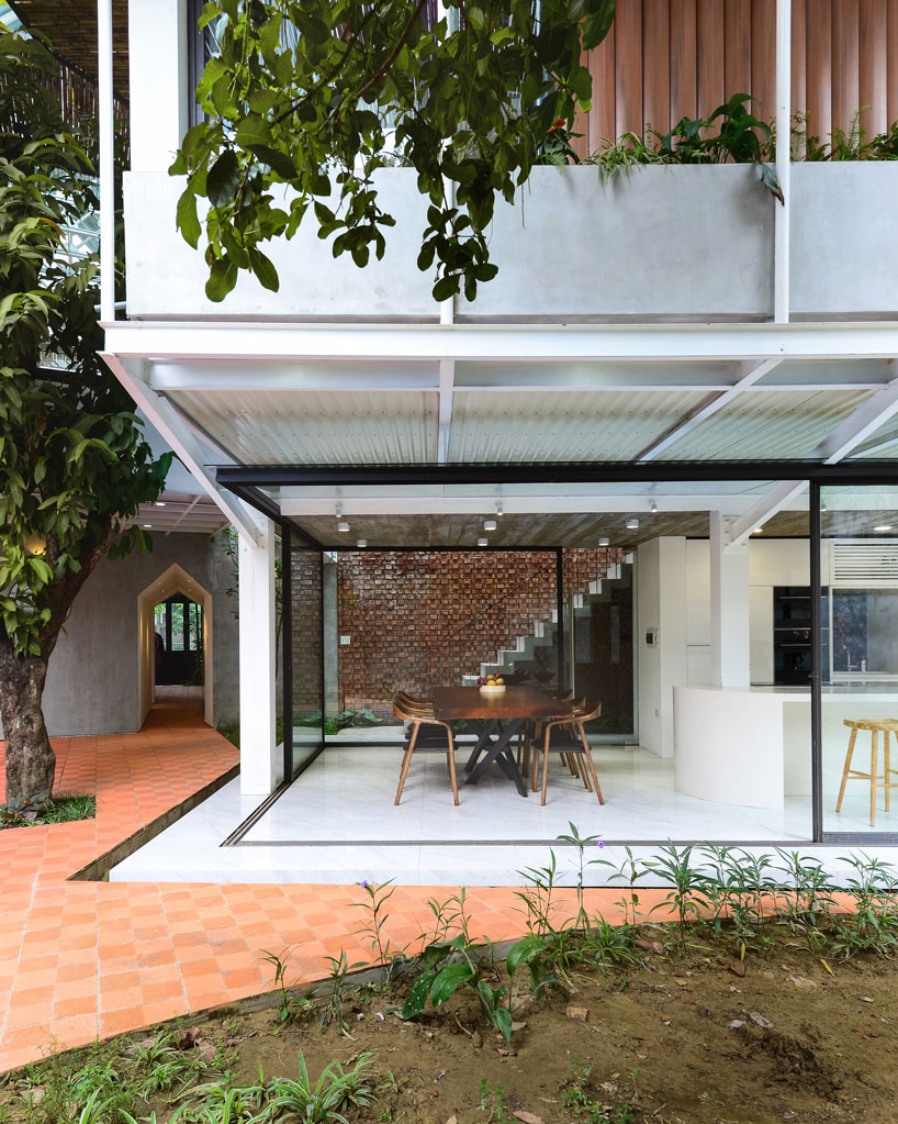 AD+studio builds the 'stacking-roof-house' for a young couple in vietnam designboom