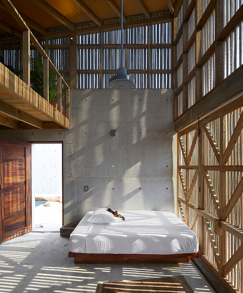 BAAQ' arranges four wood + concrete volumes into 'casa naila' house in oaxaca, mexico