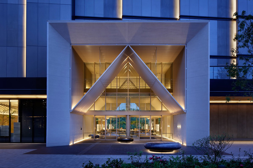 curiosity completes sorano hotel with tent-shaped entrance in tokyo