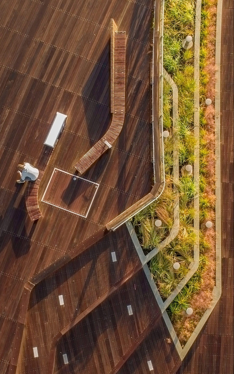 INFORM studio + buro happold build terraced gardens into providence pedestrian bridge designboom