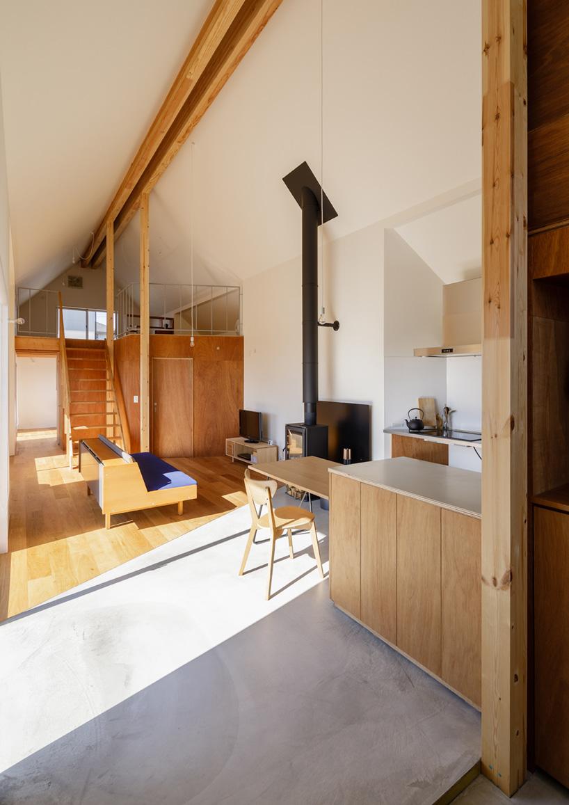SNARK + OUVI top wooden house in saishikada, japan, with pitched roof