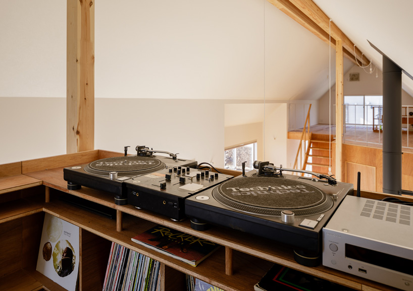 SNARK + OUVI top wooden house in saishikada, japan, with pitched roof