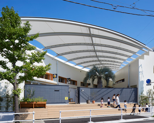 naf architect + design tops 'seiwa' kindergarten arcade with membrane roof in tokyo