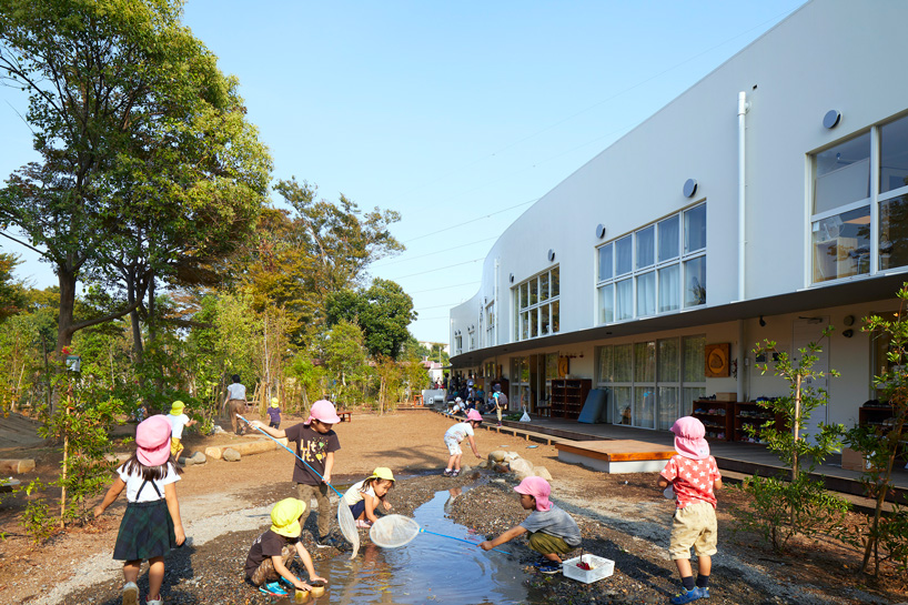 naf architect + design tops 'seiwa' kindergarten arcade with membrane roof in tokyo