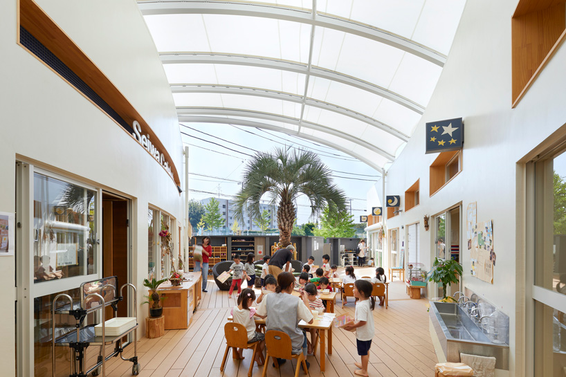 naf architect + design tops 'seiwa' kindergarten arcade with membrane roof in tokyo