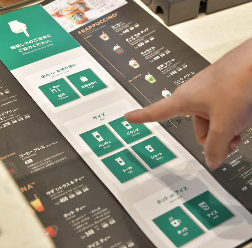starbucks opens first signing store in japan for the deaf and hard of hearing designboom