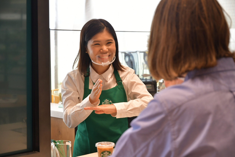 starbucks opens first signing store in japan for the deaf and hard of hearing designboom