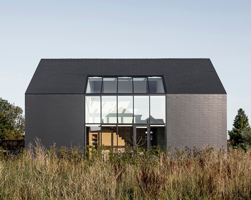 studio AAAN designs house zevenhuizen as a 'pure black sculpture' in the netherlands