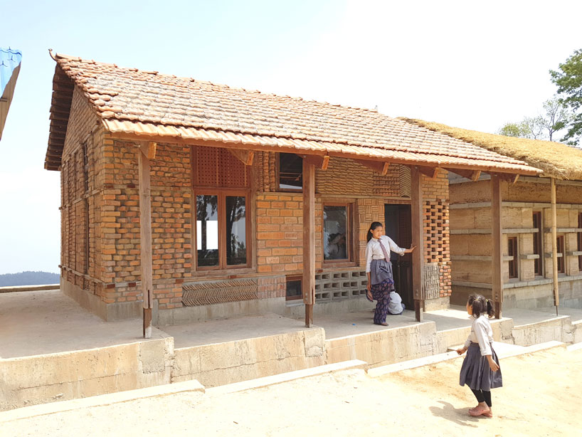 supertecture uses donated bricks from earthquake ruins to extend a school in nepal designboom
