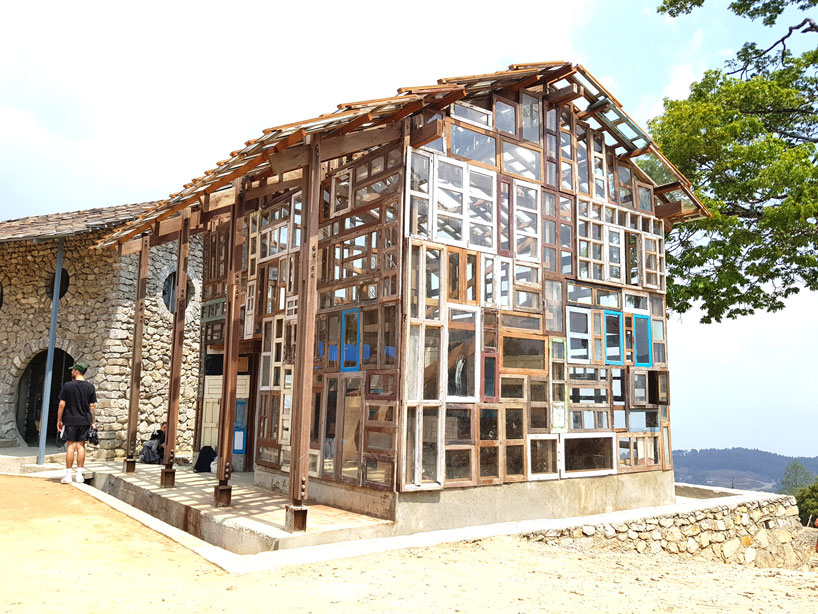 supertecture uses donated bricks from earthquake ruins to extend a school in nepal designboom