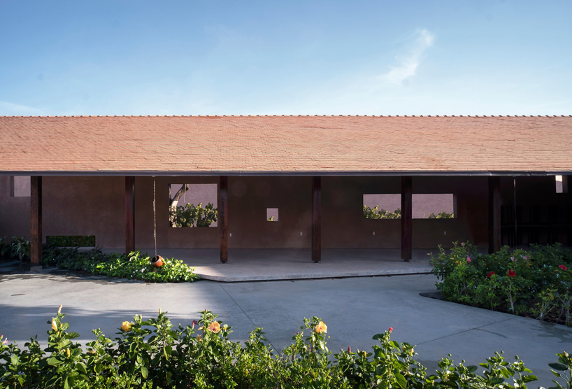 steep-slope roofs top the volumes of TAA design's 'phu my garden' park in vietnam