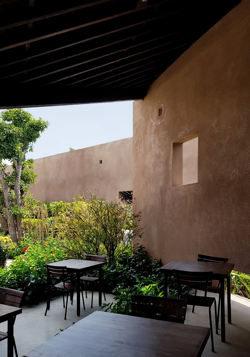 steep-slope roofs top the volumes of TAA design's 'phu my garden' park in vietnam