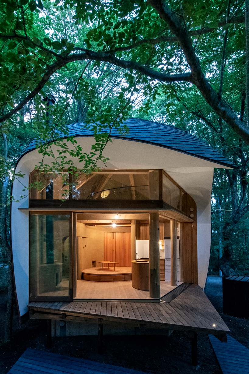 organic timber forms blend tono mirai's shell house into a japanese forest designboom