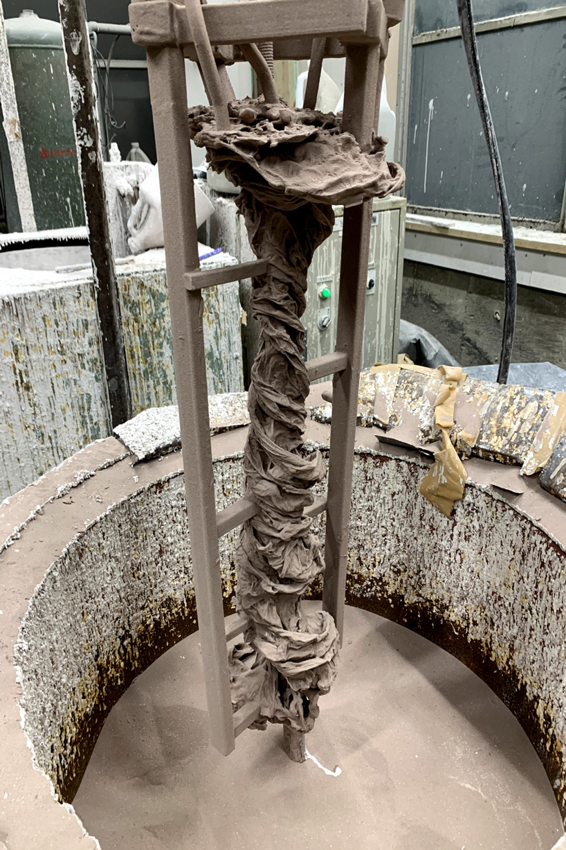 we+ captures the shape of a water vortex to create the 'swirl' light fixture designboom