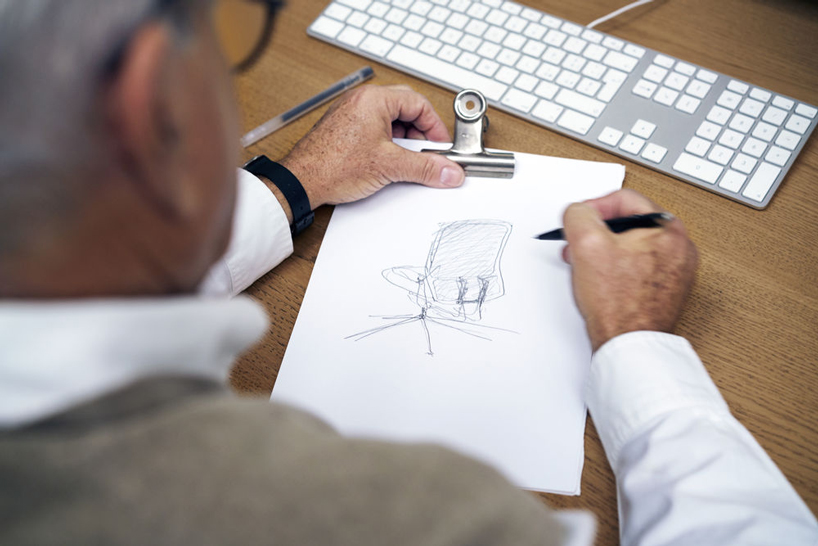 a sketch showing the design process behind alberto meda's chair for vitra