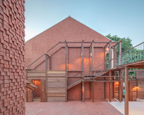 handmade bricks form the 'baan pomphet' restaurant and hotel in ayutthaya, thailand