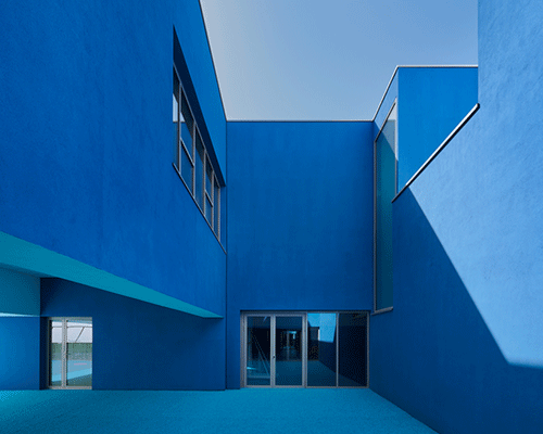 dominique coulon applies varying shades of blue to school group 'rené beauverie' in france