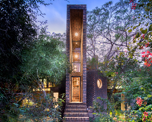 frankie pappas hides off-grid brick house within south africa nature reserve