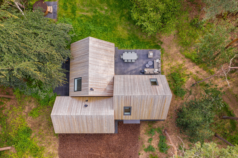 hofmandujardin combines three wood-clad volumes into 'villa tonden' in the netherlands