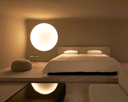 kyoto hotel room by kubo tsushima features a 'moon' light fixture that waxes and wanes