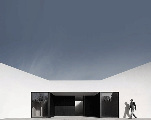 OAB shapes artists' residence in spain as simple, white pavilion set with void courtyards