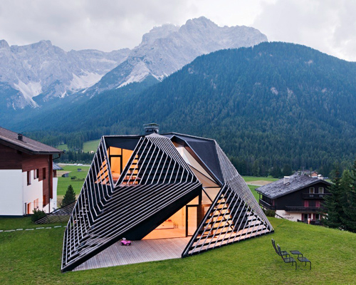 plasma studio cloaks a faceted timber skin over its tyrolean 'paramount alma' house