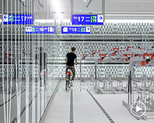 this bicycle parking garage in the netherlands offers a museum-like experience