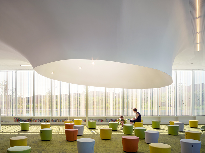 RDHA tops its springdale library in ontario with a fluid, undulating topography - 10