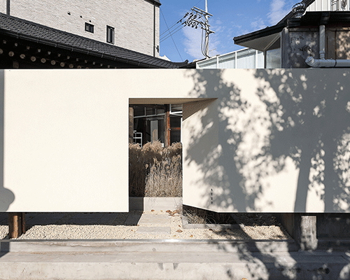 studio maoom clads traditional korean hanoks with solid surface to create restaurant in seoul