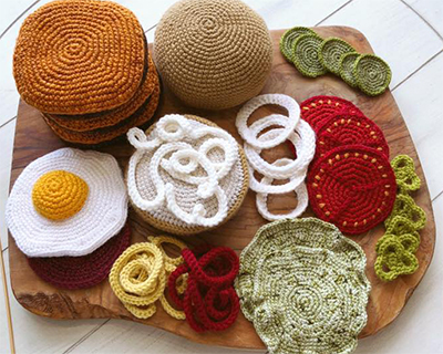feast your eyes upon this woolly, high-in-fiber crocheted burger with fixings