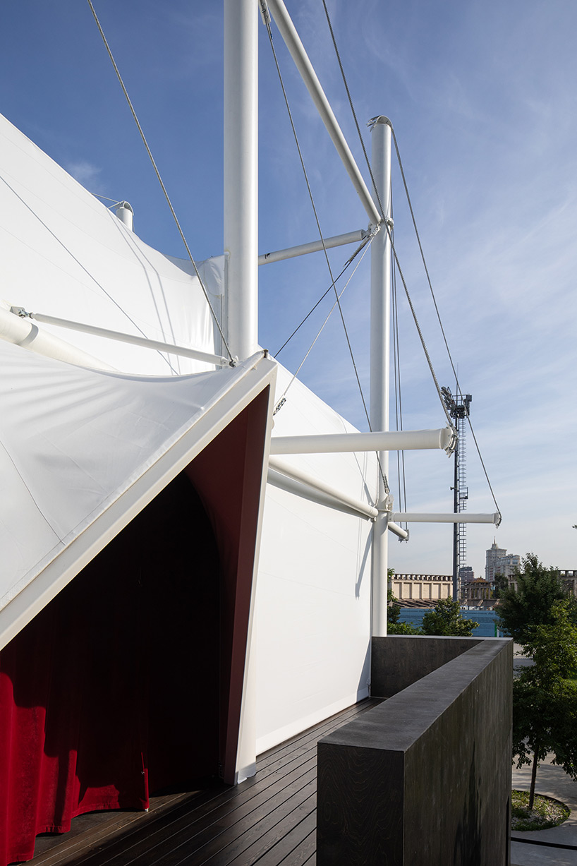 SNKH's pop-up cinema at moscow's garage museum resembles an inverted bedouin tent - 4