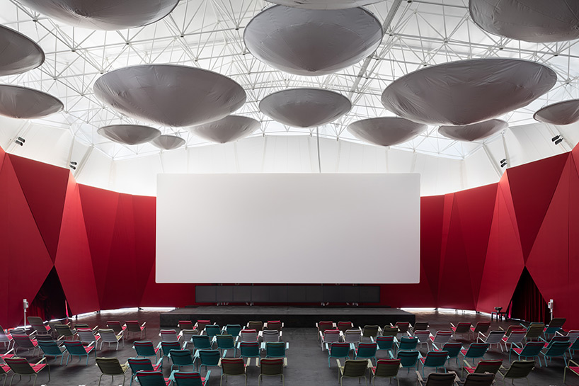 SNKH's pop-up cinema at moscow's garage museum resembles an inverted bedouin tent - 5
