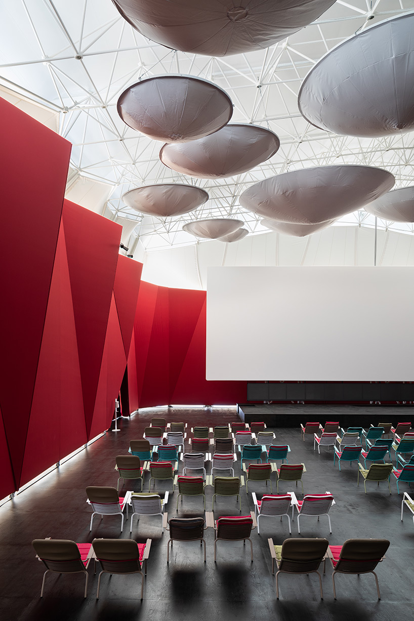 SNKH's pop-up cinema at moscow's garage museum resembles an inverted bedouin tent - 6