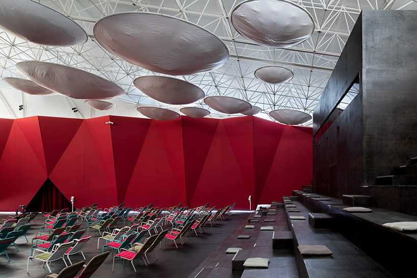 SNKH's pop-up cinema at moscow's garage museum resembles an inverted bedouin tent - 7