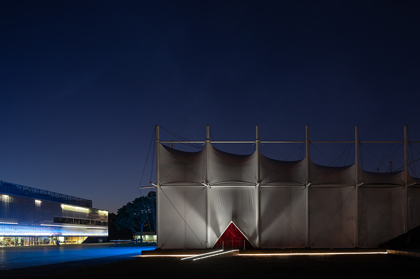 SNKH's pop-up cinema at moscow's garage museum resembles an inverted bedouin tent - 11