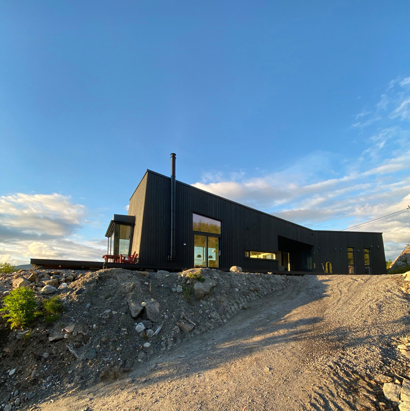 'senja' cabin by bjørnådal arkitektstudio takes the form of norwegian stones + mountains