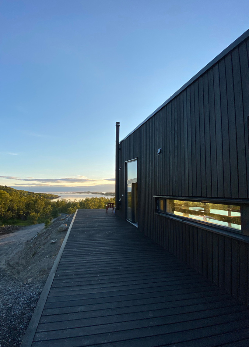 the family cottage offers panoramic views of senja's mountains and nature