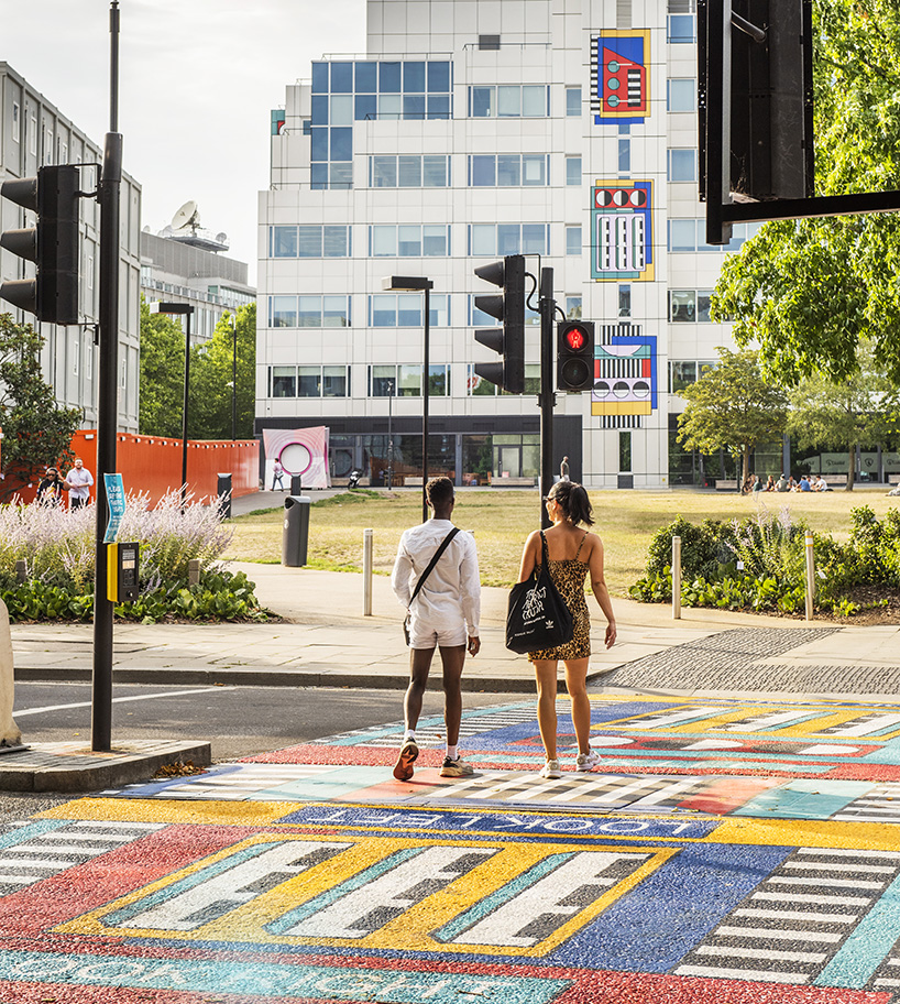 camille walala transforms  london's white city place with colorful geometric patterns