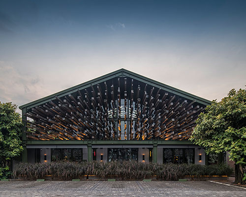 floating wood logs and tropical interiors adorn 'kayu kayu' restaurant in indonesia