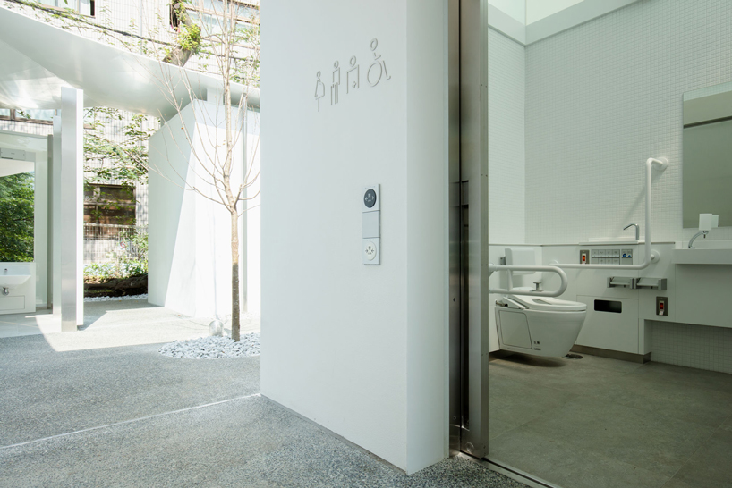 fumihiko maki's tokyo toilet is designed with a courtyard and curved roof designboom
