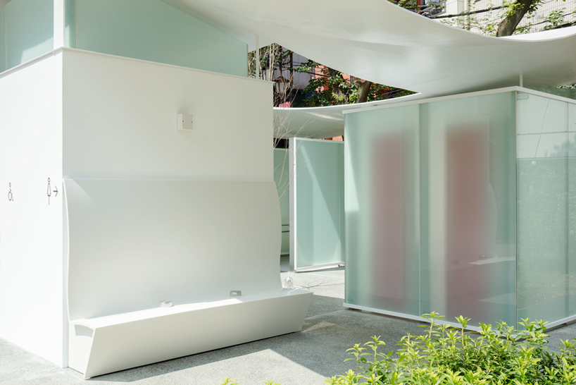 fumihiko maki's tokyo toilet is designed with a courtyard and curved roof designboom