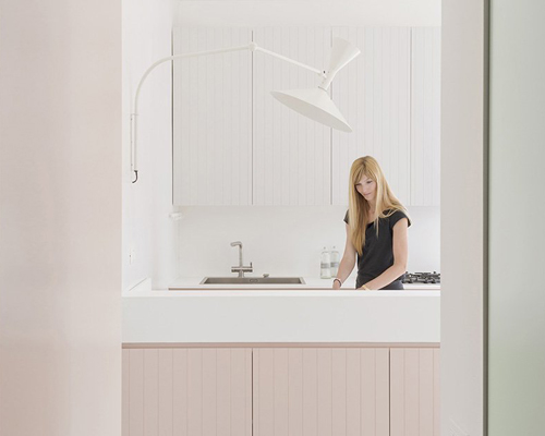 a pastel-colored vestibule forms the core of this apartment in camogli, italy