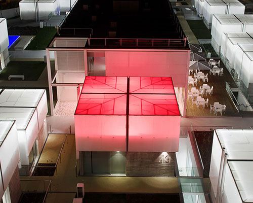 guedes cruz builds social housing with illuminating box roofs for the elderly in portugal