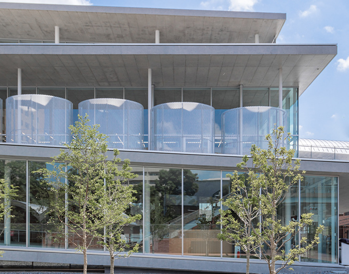 glazed façades allow natural light to enter, while carefully positioned