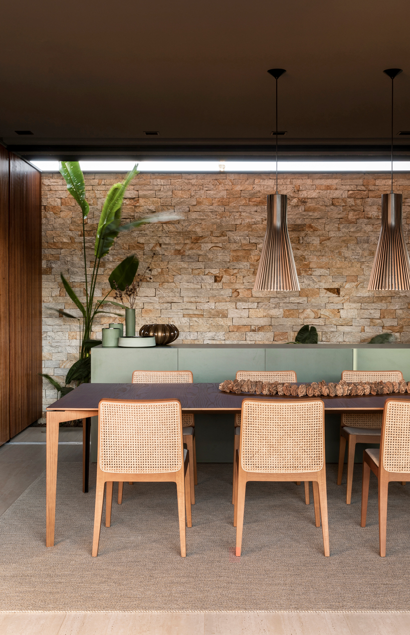 mf+arquitetos applies black cobogó bricks to house in franca, brazil designboom