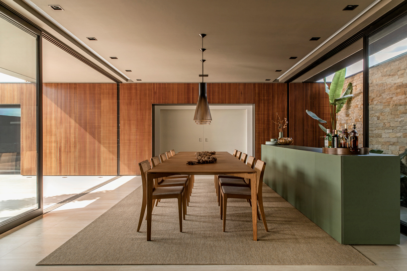 mf+arquitetos applies black cobogó bricks to house in franca, brazil designboom